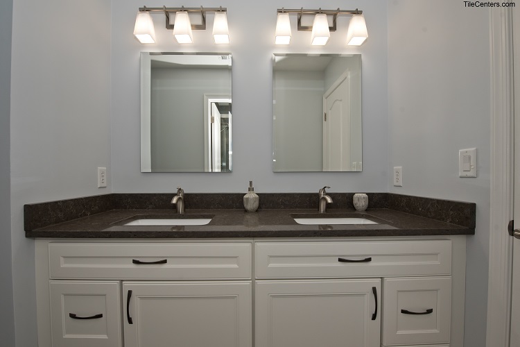 Bathroom Vanity with Black Countertop and White Cabinets