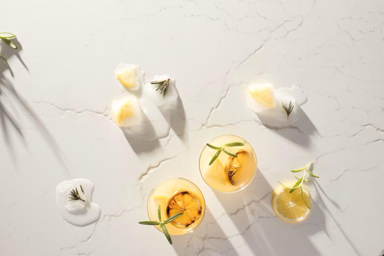 Quartz countertop with some decorations.