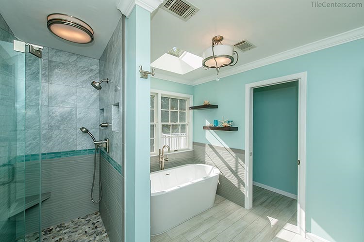 Bathroom remodel with shower enclosure and stand alone tub