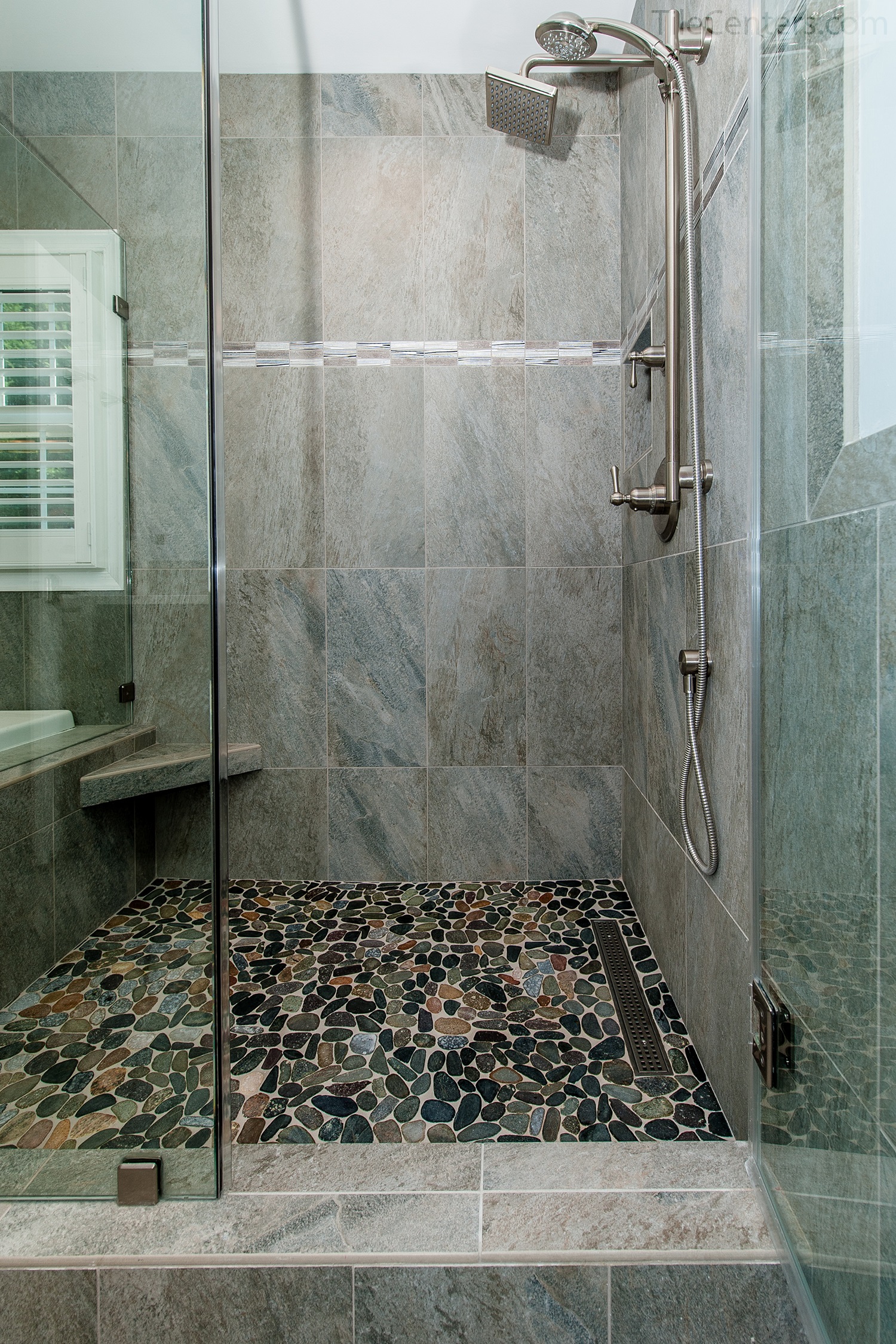 Master bathroom features Neapolitan limestone shower with caramel crystals  and with river rock pebble path to shower., image size:1500x2250
