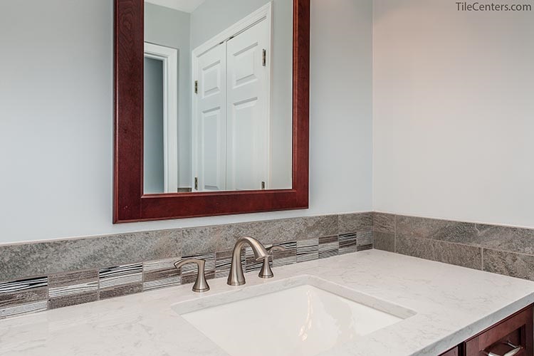 White Grey Bathroom Countertop with Brushed Nickel Faucets