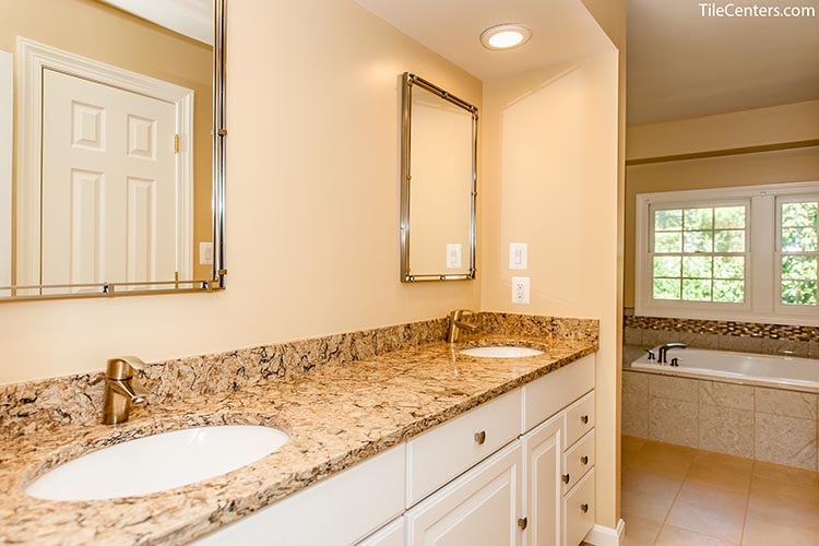 Multicolor bathroom countertop with white vanity