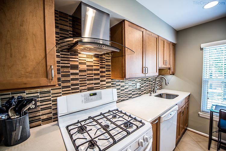 Kitchen backsplash with natural stone mosaic tile and glass tile