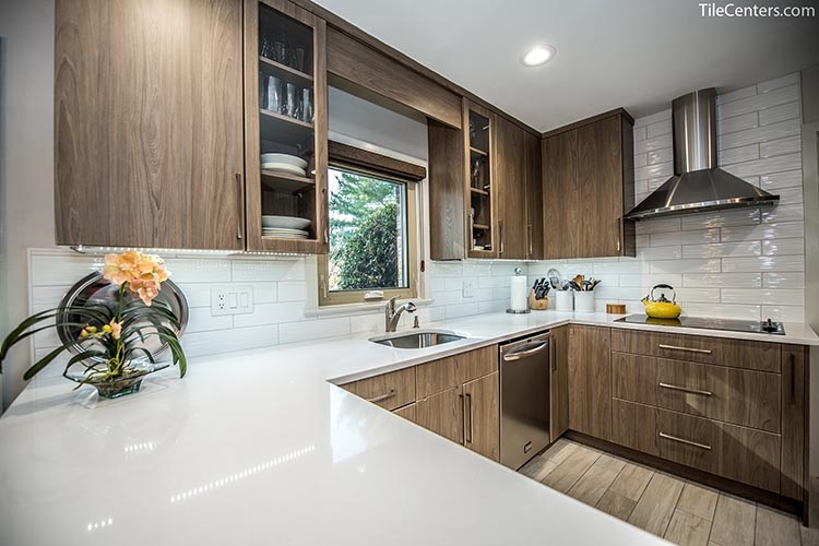 White Kitchen Countertop with Satin Nickel Faucet