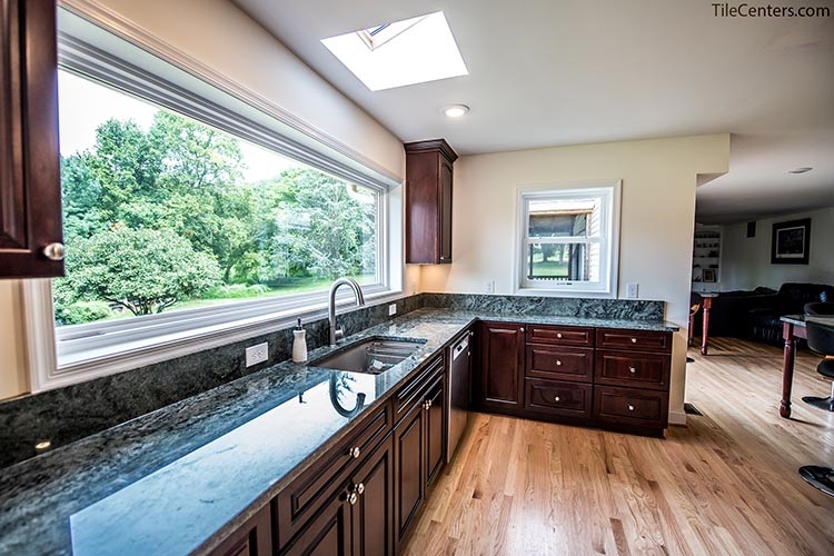 Dark Grey Kitchen Countertop with Chrome Faucet