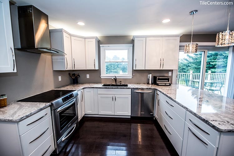 White and Grey Kitchen Remodel with Maple Wood Floors