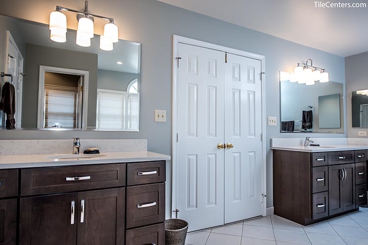 Bathroom Vanity with Dark Brown Cabinets and Chrome Faucets