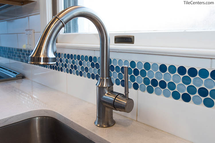 Brush Nickel Faucet with Blue Backsplash