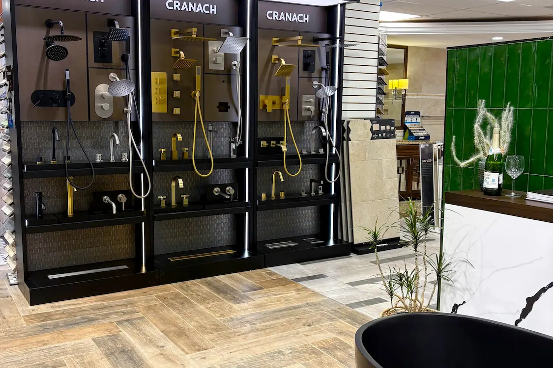 Tile Center kitchen and bath remodeling showroom interior with cranach fixtures display.